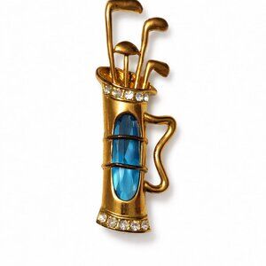 Gold golf bag brooch with blue rhinestone